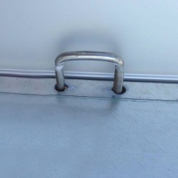 Anneau d'attache pour benne